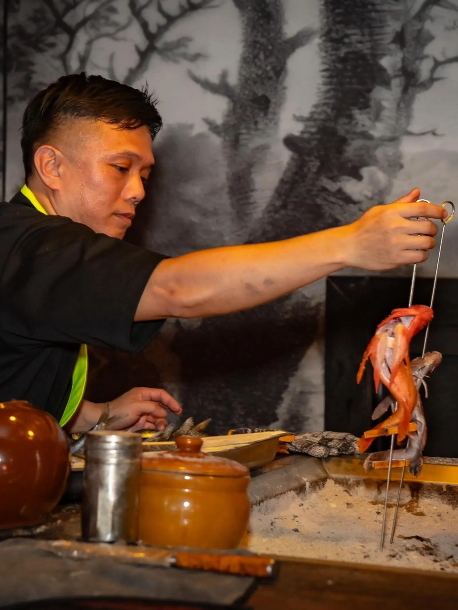 Chef tending the sand grill
